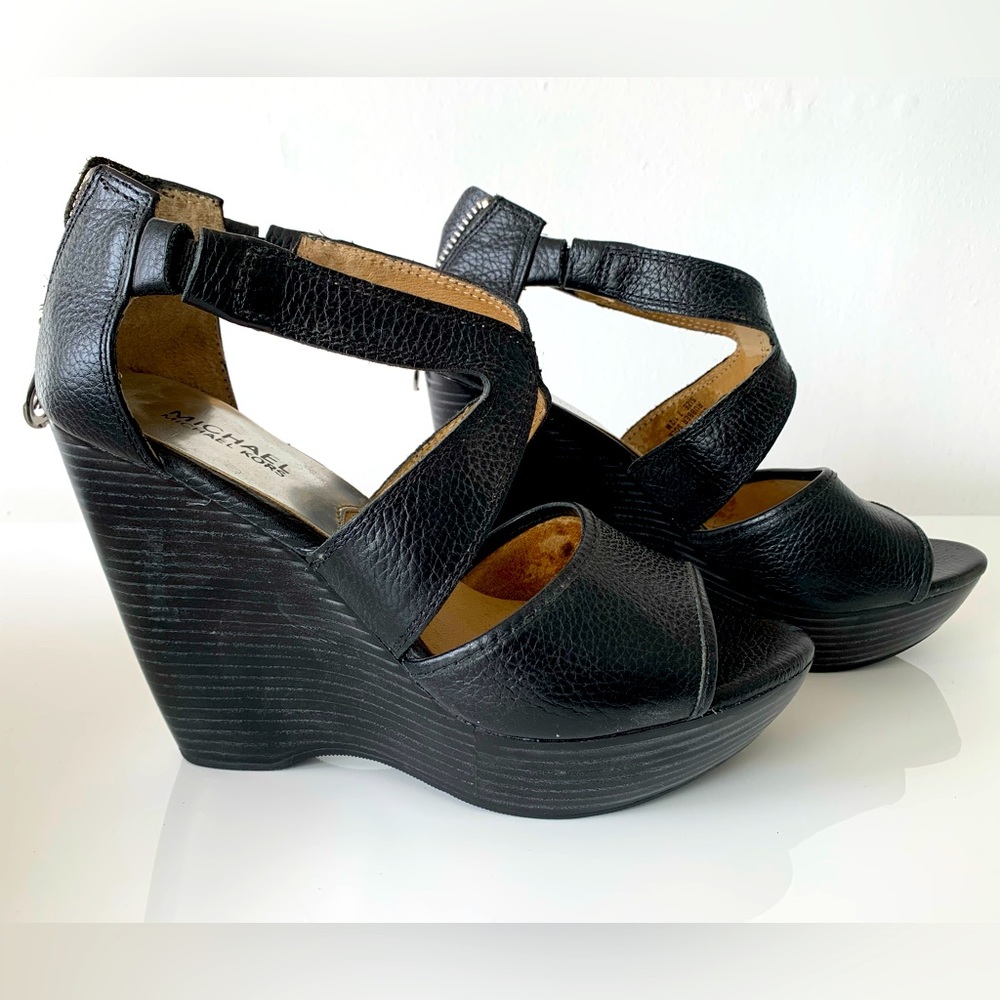 Michael Kors dramatic black leather strap-like wedges, zipper back. Size 7.5.